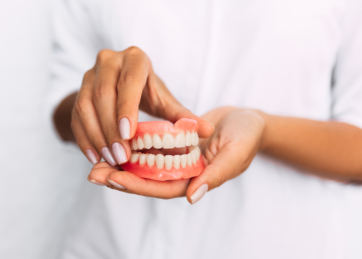 Dentures restore smiles for those with missing teeth from age, injury, or decay